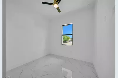 2609 21st St SW, Lehigh Acres, FL 33976 - Photo 19