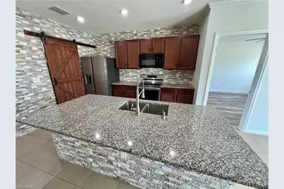 10293 Silver Pond Ln, Lehigh Acres, FL 33936 - Photo 13