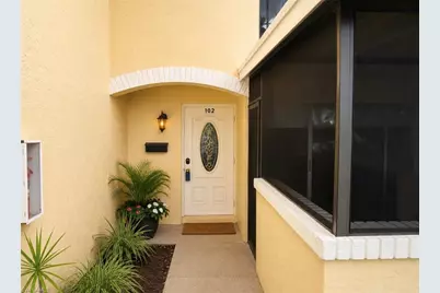 102 E Greens Blvd, Lehigh Acres, FL 33936 - Photo 1
