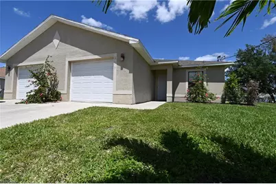 613 SE 14th St, Cape Coral, FL 33990 - Photo 1