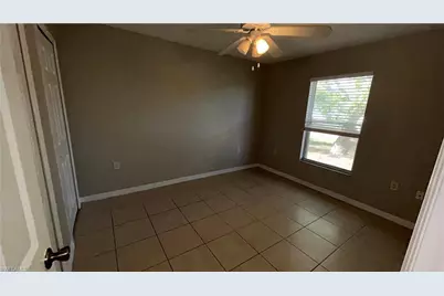 10738 Cocoatree Ct, Lehigh Acres, FL 33936 - Photo 11