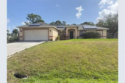 817 Holmes Ave, Lehigh Acres, FL 33974 - Photo 1