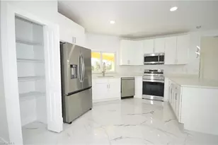 1132 Edelweiss St E, Lehigh Acres, FL 33974 - Photo 13