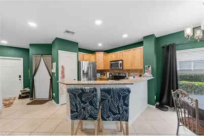 8587 Athena Ct, Lehigh Acres, FL 33971 - Photo 9