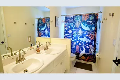 8587 Athena Ct, Lehigh Acres, FL 33971 - Photo 27