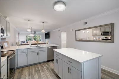 3021 Sandpiper Bay Cir #E106, Naples, FL 34112 - Photo 1