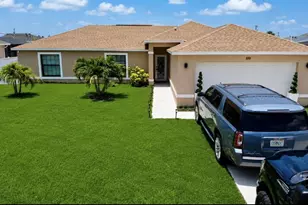 100 NW 13th Pl, Cape Coral, FL 33993 - Photo 1