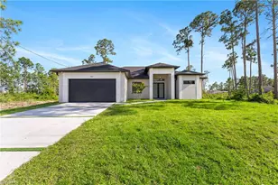 718 Phelps St E, Lehigh Acres, FL 33974 - Photo 1