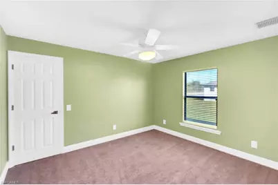 606 Morningmist Ln, Lehigh Acres, FL 33974 - Photo 13