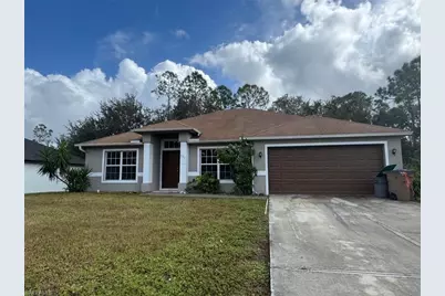 835 Downer Ave S, Lehigh Acres, FL 33974 - Photo 1