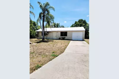 704 W Cleveland Ln, Lehigh Acres, FL 33936 - Photo 1