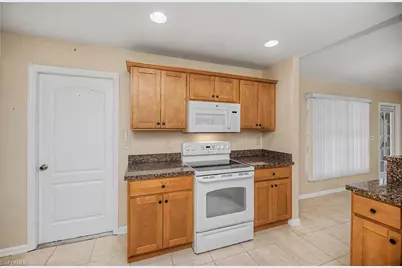 1922 Jacaranda Pkwy W, Cape Coral, FL 33993 - Photo 13