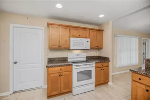 1922 Jacaranda Pkwy W, Cape Coral, FL 33993 - Photo 13
