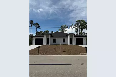609 E 12th St, Lehigh Acres, FL 33972 - Photo 1