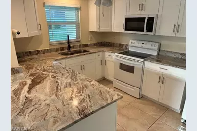 311 Tudor Dr #1-2, Cape Coral, FL 33904 - Photo 1