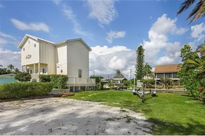 16290 Tortuga St, Bokeelia, FL 33922 - Photo 3