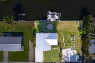 16290 Tortuga St, Bokeelia, FL 33922 - Photo 1