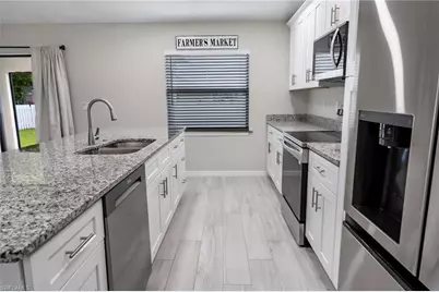 1028 Champion Ave, Lehigh Acres, FL 33971 - Photo 17