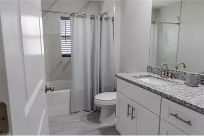 1028 Champion Ave, Lehigh Acres, FL 33971 - Photo 31