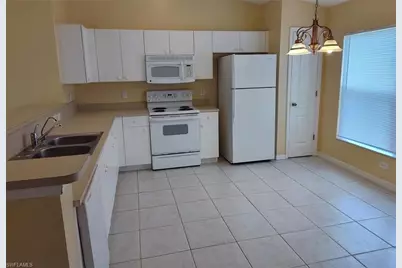 1109 NE 2nd Pl, Cape Coral, FL 33909 - Photo 9