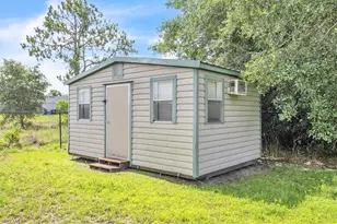 2703 38th St SW, Lehigh Acres, FL 33976 - Photo 45