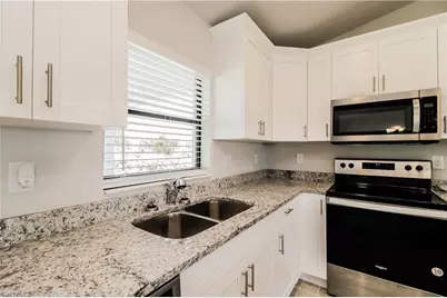 2702 31st St SW, Lehigh Acres, FL 33976 - Photo 5