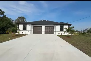 404-406 Chalet Ave S, Lehigh Acres, FL 33974 - Photo 1