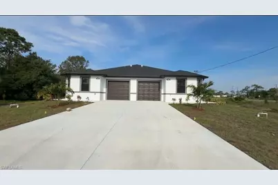 406 Chalet Ave S, Lehigh Acres, FL 33974 - Photo 1