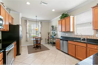 11430 Icarus Cir, Lehigh Acres, FL 33971 - Photo 11