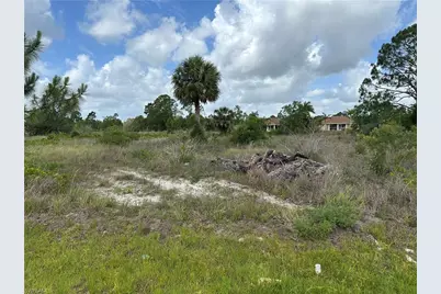 908 Panda Dr, Lehigh Acres, FL 33974 - Photo 1