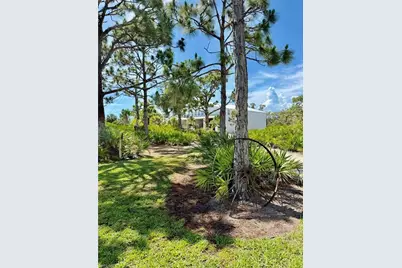 6690 Pineland Rd, Bokeelia, FL 33922 - Photo 9