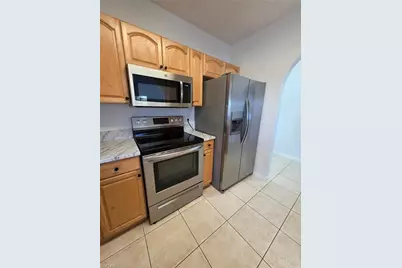 2261 Somerset Ridge Dr #204, Lehigh Acres, FL 33973 - Photo 9
