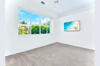 571 Chamonix Ave S, Lehigh Acres, FL 33974 - Photo 19