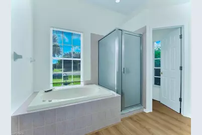 571 Chamonix Ave S, Lehigh Acres, FL 33974 - Photo 11