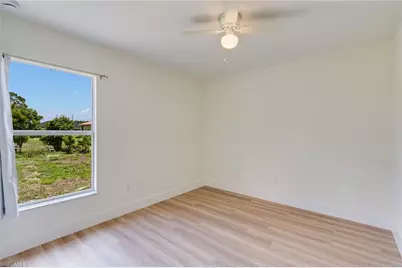104 Denis Ave N, Lehigh Acres, FL 33971 - Photo 15