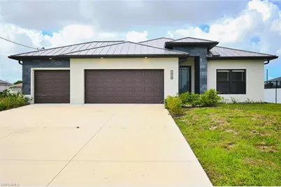 1918 SW 1st St, Cape Coral, FL 33991 - Photo 1