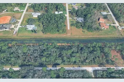 1025 Asther St E, Lehigh Acres, FL 33974 - Photo 3
