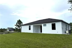 1134 Holmes Ave S, Lehigh Acres, FL 33974 - Photo 25