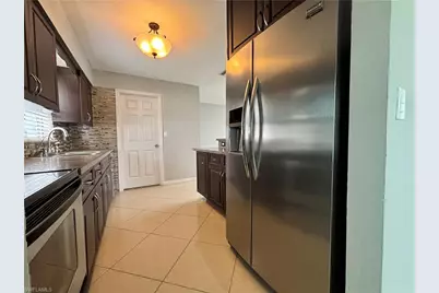 209 Punta Alta Ct, Lehigh Acres, FL 33936 - Photo 11