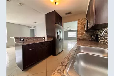 209 Punta Alta Ct, Lehigh Acres, FL 33936 - Photo 13