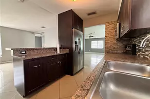 209 Punta Alta Ct, Lehigh Acres, FL 33936 - Photo 13