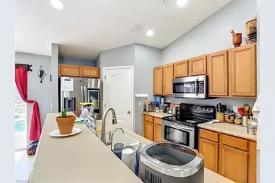 704 Moore Ave, Lehigh Acres, FL 33972 - Photo 15