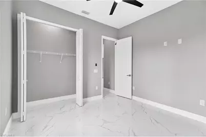 1114 Bari St E, Lehigh Acres, FL 33974 - Photo 25