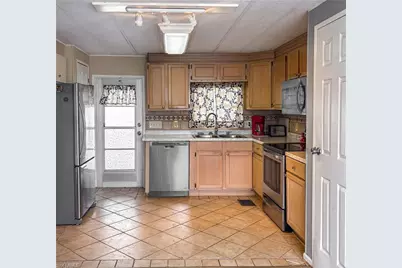 5558 Sir Walter Way, North Fort Myers, FL 33917 - Photo 3