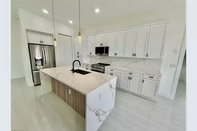 2706 Floyd Ave S, Lehigh Acres, FL 33976 - Photo 13