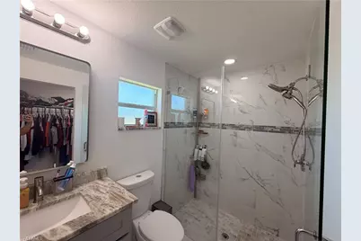 4702 Loraine Ave S, Lehigh Acres, FL 33976 - Photo 13