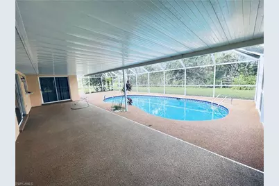 546 Whispering Wind Bend, Lehigh Acres, FL 33974 - Photo 13
