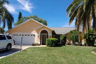 546 Whispering Wind Bend, Lehigh Acres, FL 33974 - Photo 1