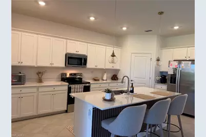 20555 Copperhead Dr, Lehigh Acres, FL 33936 - Photo 27