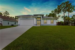 654 Trinity St E, Lehigh Acres, FL 33974 - Photo 1